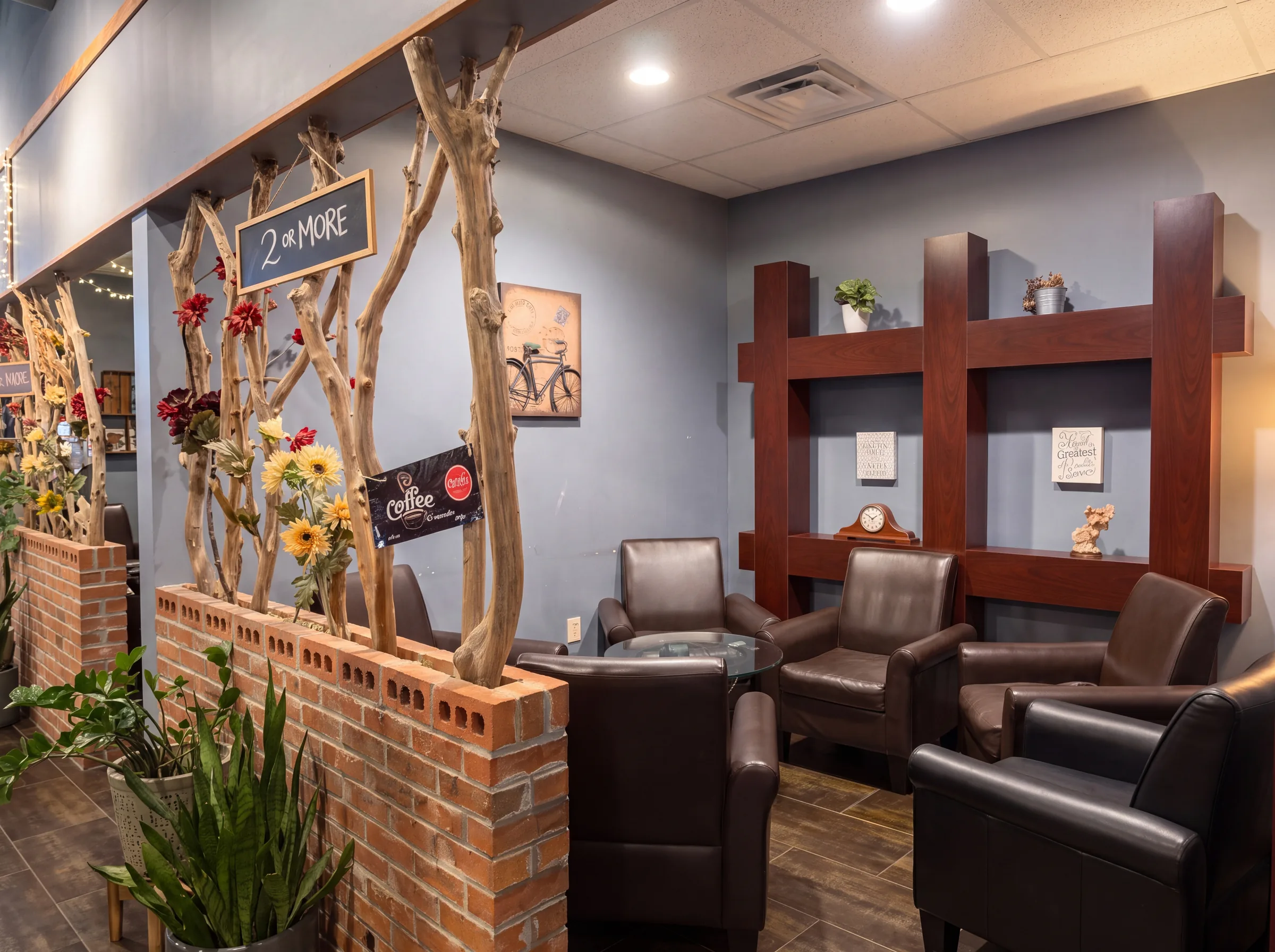 The back room, leather armchairs around a low table.