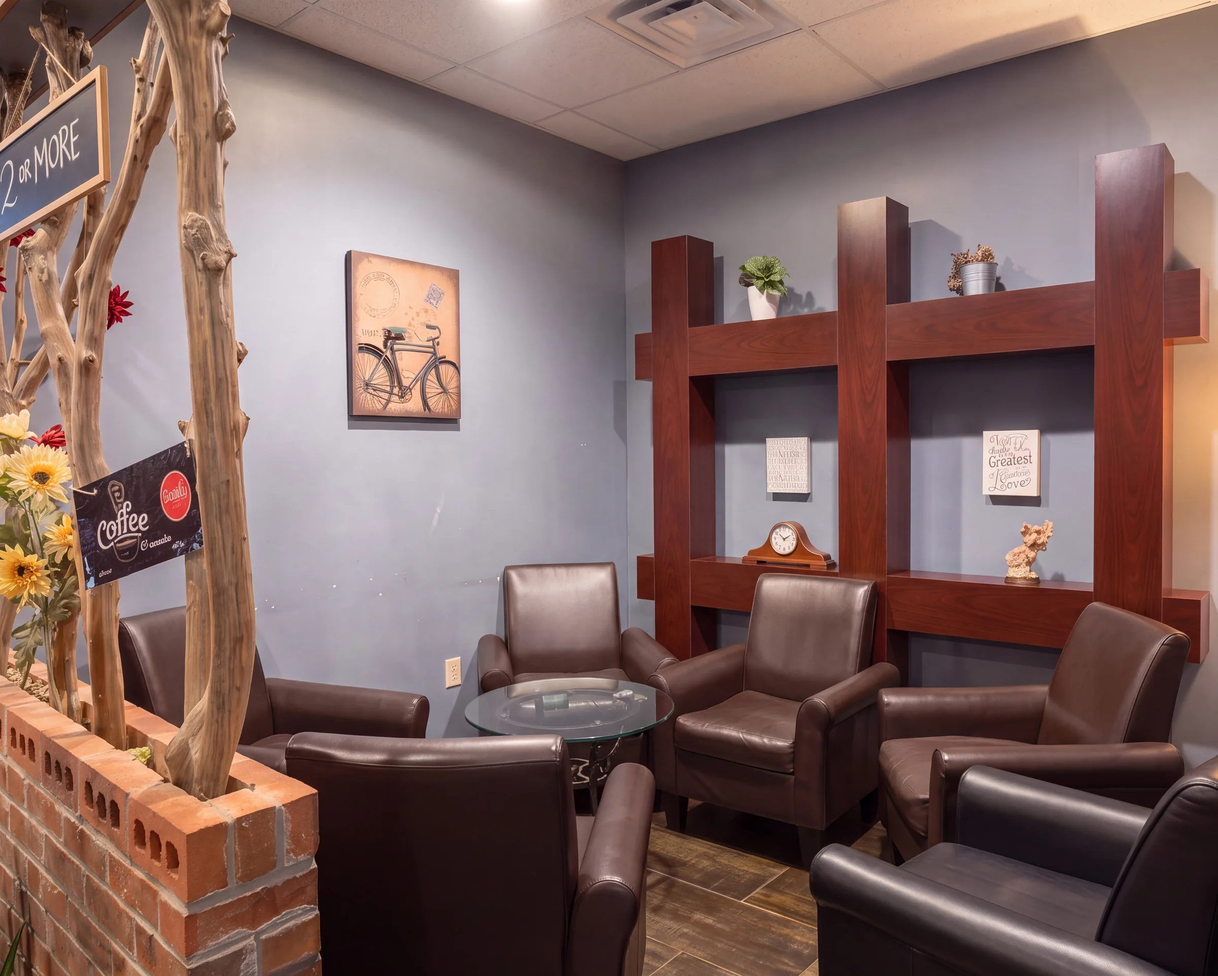 Leather armchairs in the corner of the back room.